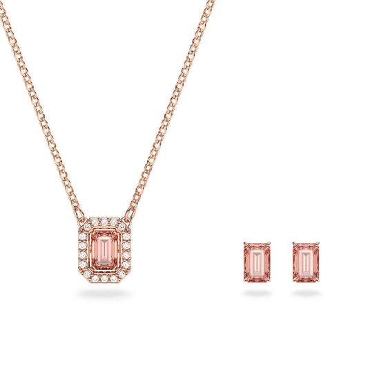 The Swarovski Pink Octagon Cut Millenia Necklace and Earrings Set by Swarovski features a rose gold-tone necklace with a rectangular pink gemstone pendant and coordinating stud earrings, both outlined by small diamonds. This elegant set is beautifully presented against a white background, adding a touch of luxury to any outfit.