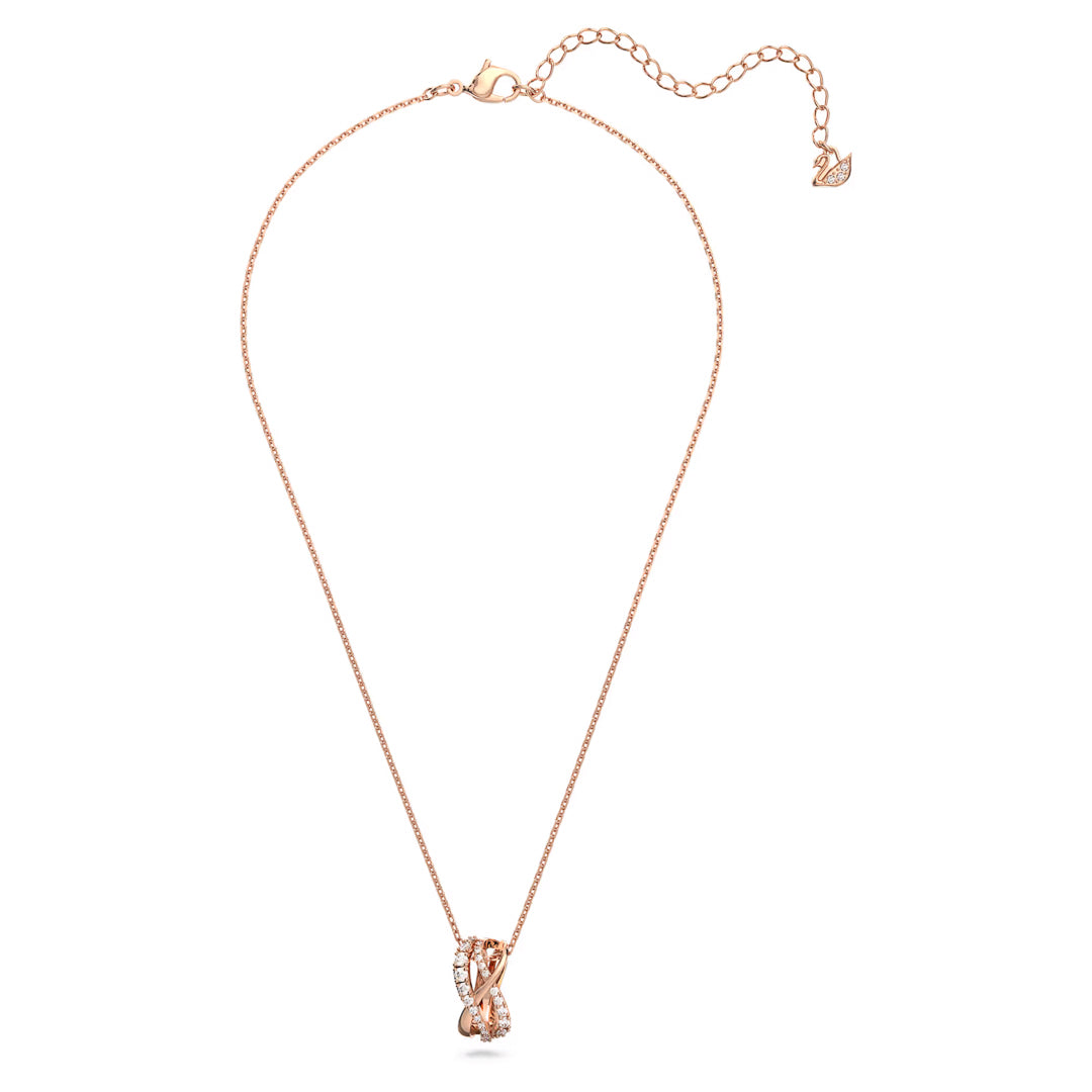 The Swarovski Hyperbola Necklace Pendant by Swarovski is a delicate rose gold-toned piece featuring a swan-shaped pendant adorned with shimmering zirconia crystals. It includes an adjustable chain with a clasp and a small decorative swan charm near the clasp.