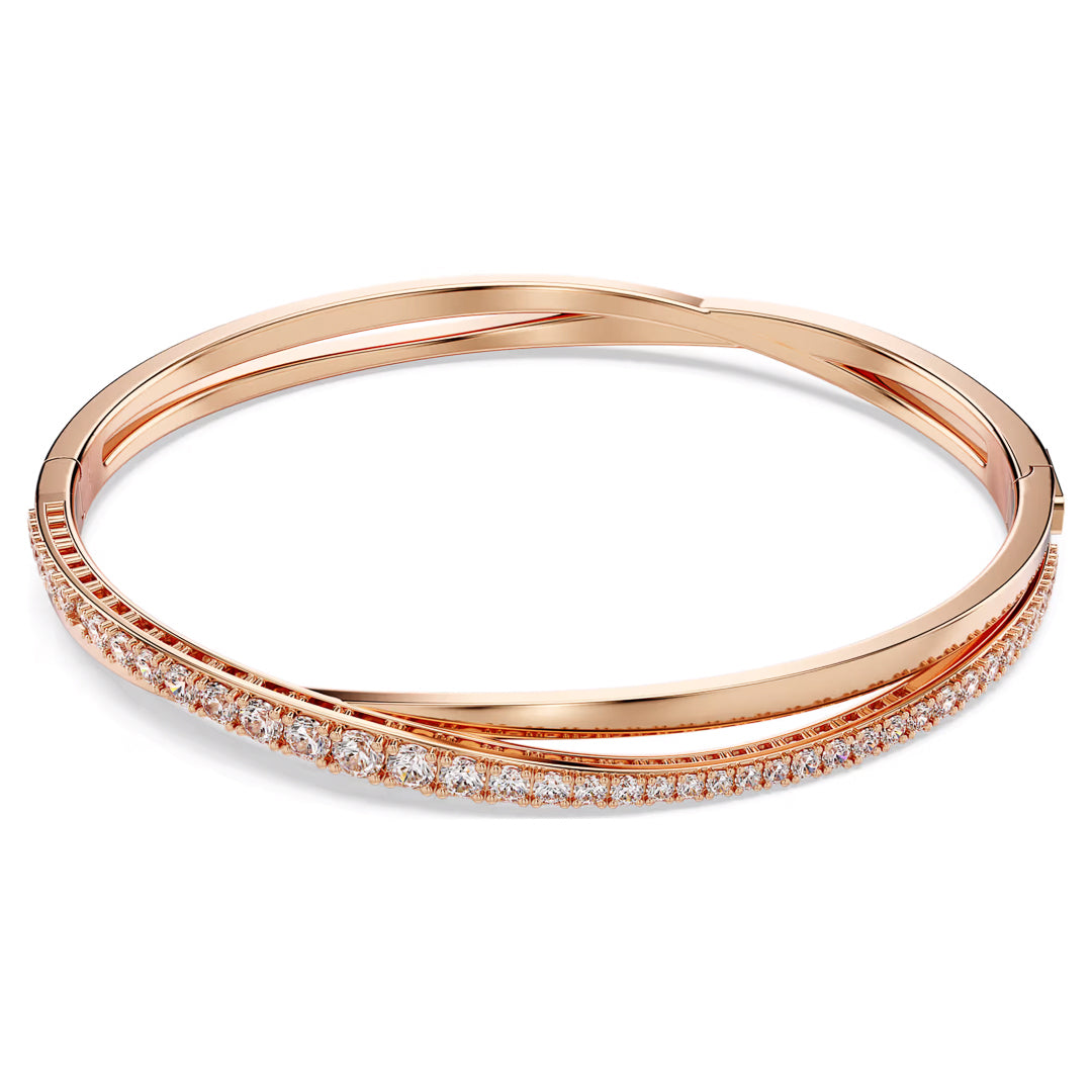 The Swarovski Hyperbola Bracelet epitomizes classic luxury, featuring radiant diamonds in a sleek, overlapping design.