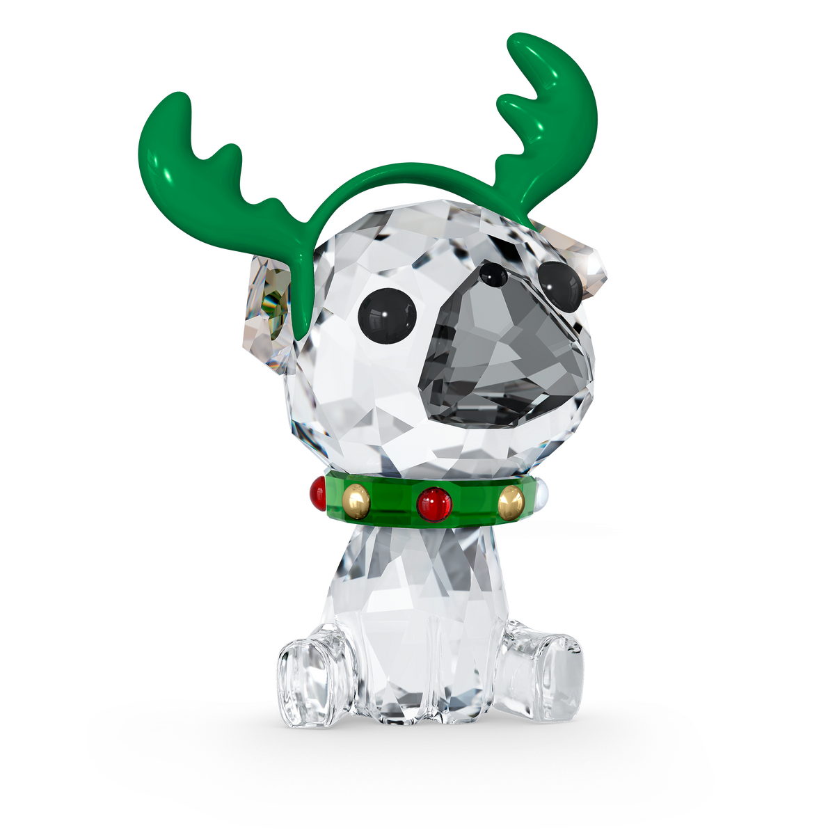 A Swarovski Holiday Cheers Pug crystal figurine by Swarovski, featuring a sitting dog adorned with green antlers and a festive collar accented in red and gold, displayed on a plain white background. Available at Raffi Jewellers, an authorized retailer of Swarovski Canada.