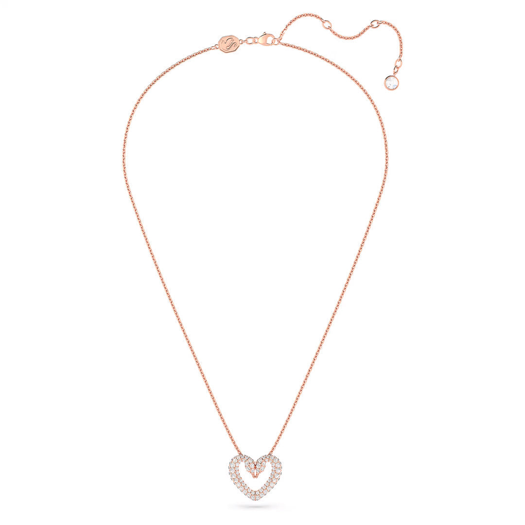 The Swarovski Sublima Necklace Pendant showcases a sophisticated design with a rose gold-tone plated chain and a heart-shaped pendant adorned with pavé crystals.