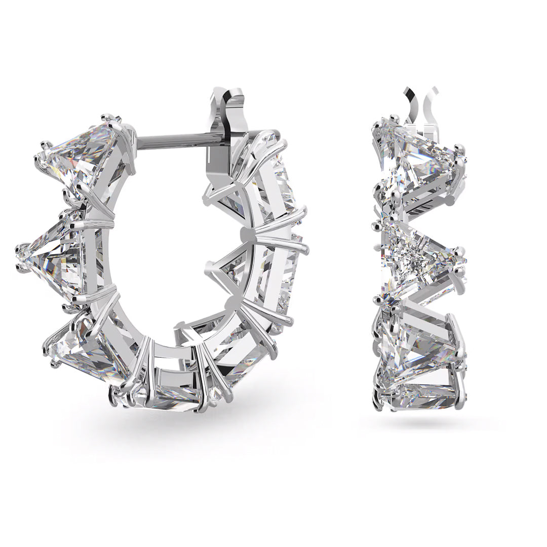 Introducing the Swarovski Matrix Hoop Earrings by Swarovski: Skillfully crafted in rhodium-plated silver, these hoop earrings showcase a captivating array of triangular-cut clear gemstones. Each zirconia is gracefully secured in exquisite settings, resulting in an elegant and dazzling look.