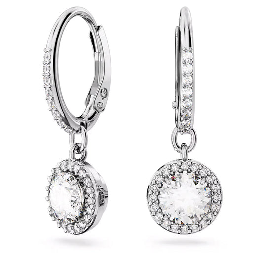 The Swarovski Una Angelic Drop Earrings feature elegant rhodium-plated silver hoops, beautifully adorned with sparkling round diamond pendants encircled by a halo of smaller diamonds. The lever-back clasps ensure secure fastening, making them perfect for any occasion.