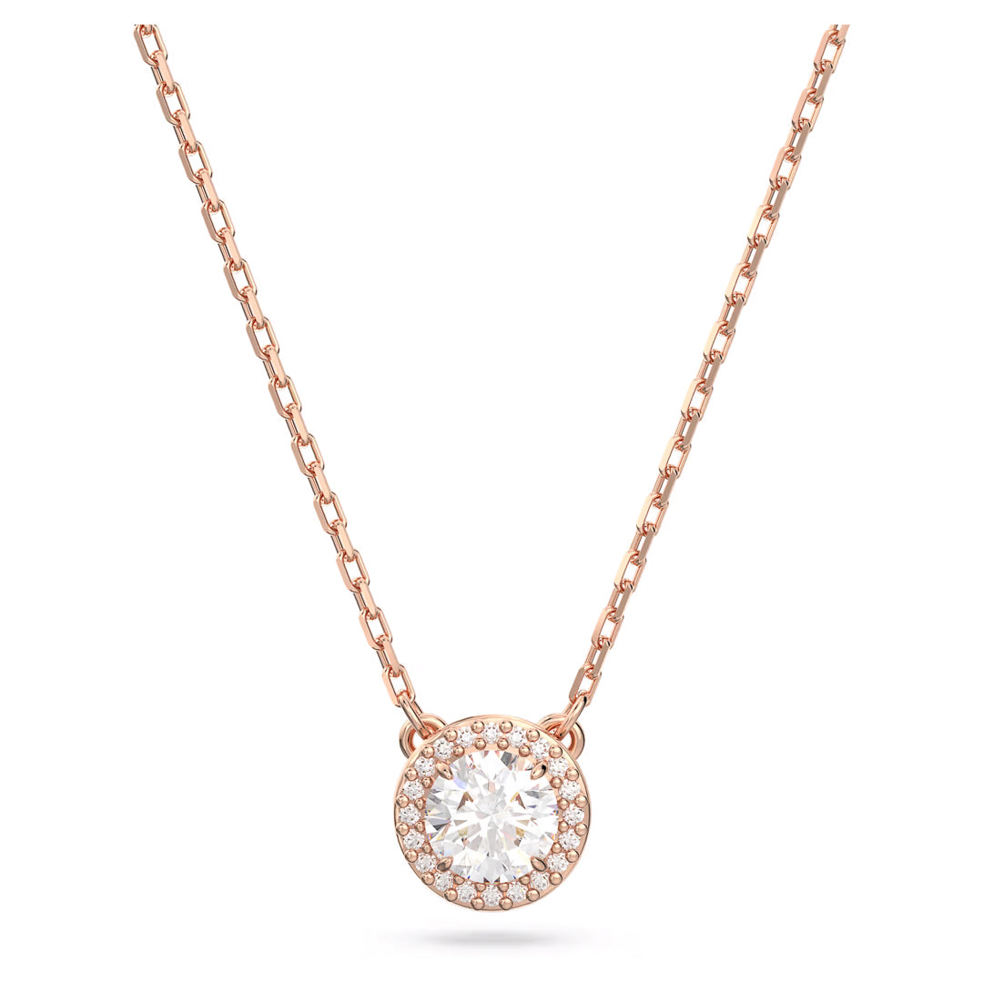 The Swarovski Una Angelic Necklace Pendant by Swarovski is a rose gold-tone necklace featuring a round pendant with a large central stone encircled by smaller diamonds, all elegantly attached to a simple chain.