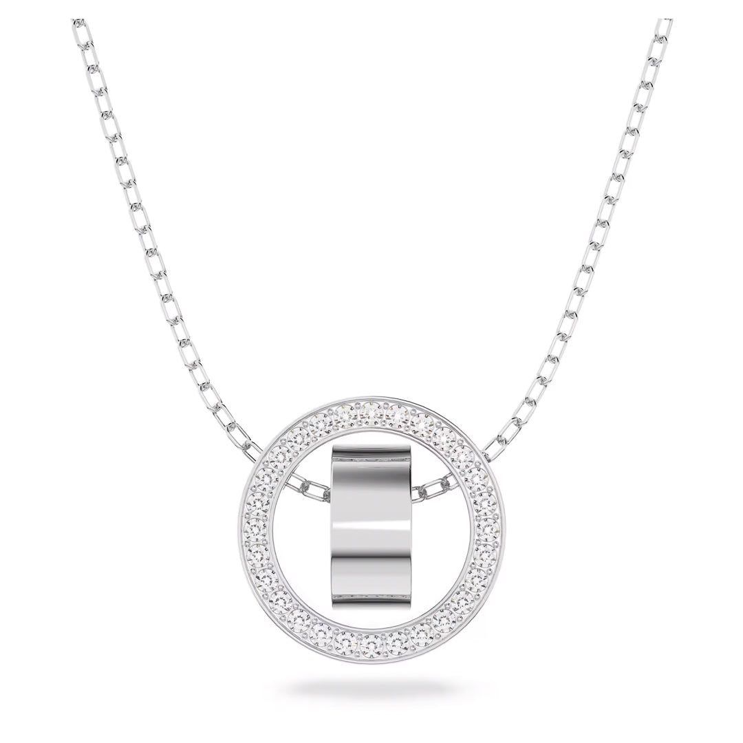 Introducing the Swarovski Dextera Necklace Pendant, a stunning piece by Swarovski. This silver necklace features a circular pendant coated with rhodium for a long-lasting shine. The smooth, shiny surface of the pendant is beautifully bordered by sparkling crystal pavé stones. Its delicate chain enhances the elegant silver tone of the pendant, making it a perfect accessory for any occasion.