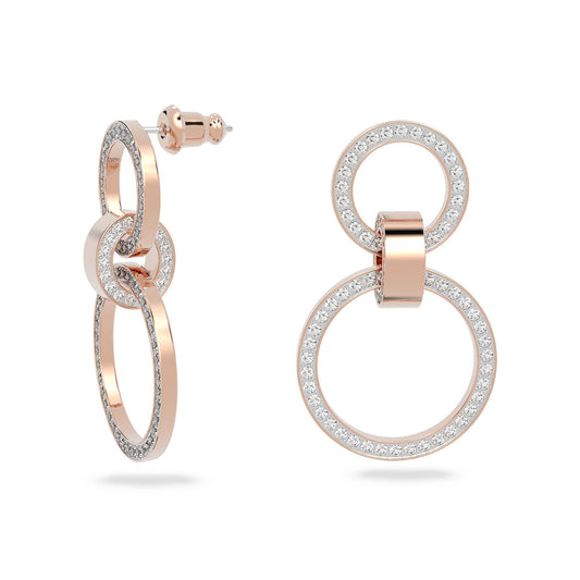 A pair of Swarovski Hollow Hoop Earrings in rose gold-tone features two interlocking circles, each encrusted with small crystals. One earring is shown from the side and the other from the front, showcasing its intricate design and crystal pavé details that sparkle brilliantly.