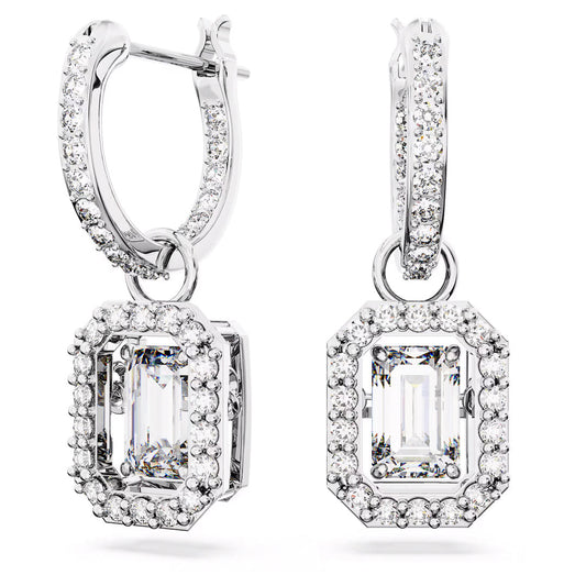 The Swarovski Una Drop Earrings by Swarovski showcase large octagon-cut gemstones encircled by smaller sparkling stones, all set in rhodium-plated silver-tone metal, offering an elegant drop hoop design.