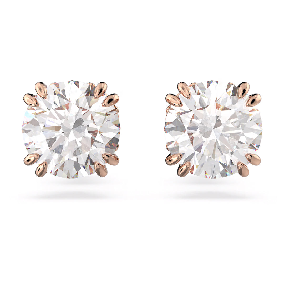 The Swarovski Stilla Stud Earrings, featuring brilliant round-cut stones set in elegant rose gold prongs, are beautifully showcased against a pristine white background.