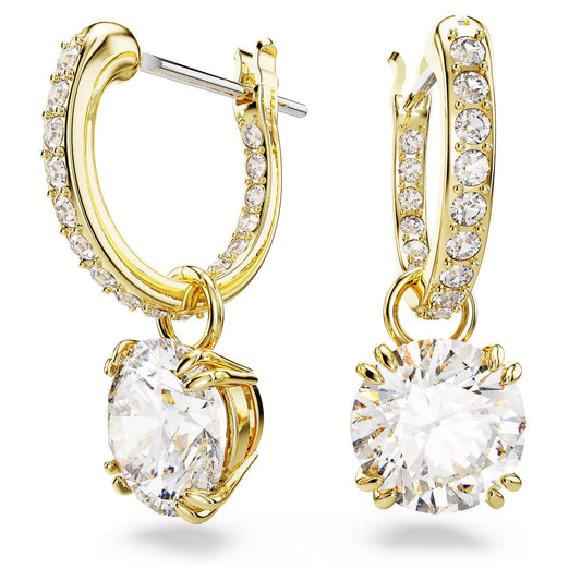 From the Swarovski Stilla collection, these drop earrings are gold-tone plated and designed with small sparkling stones. Each hoop is beautifully accented with a large, round, clear gemstone charm that elegantly dangles, adding a glamorous touch to any ensemble.