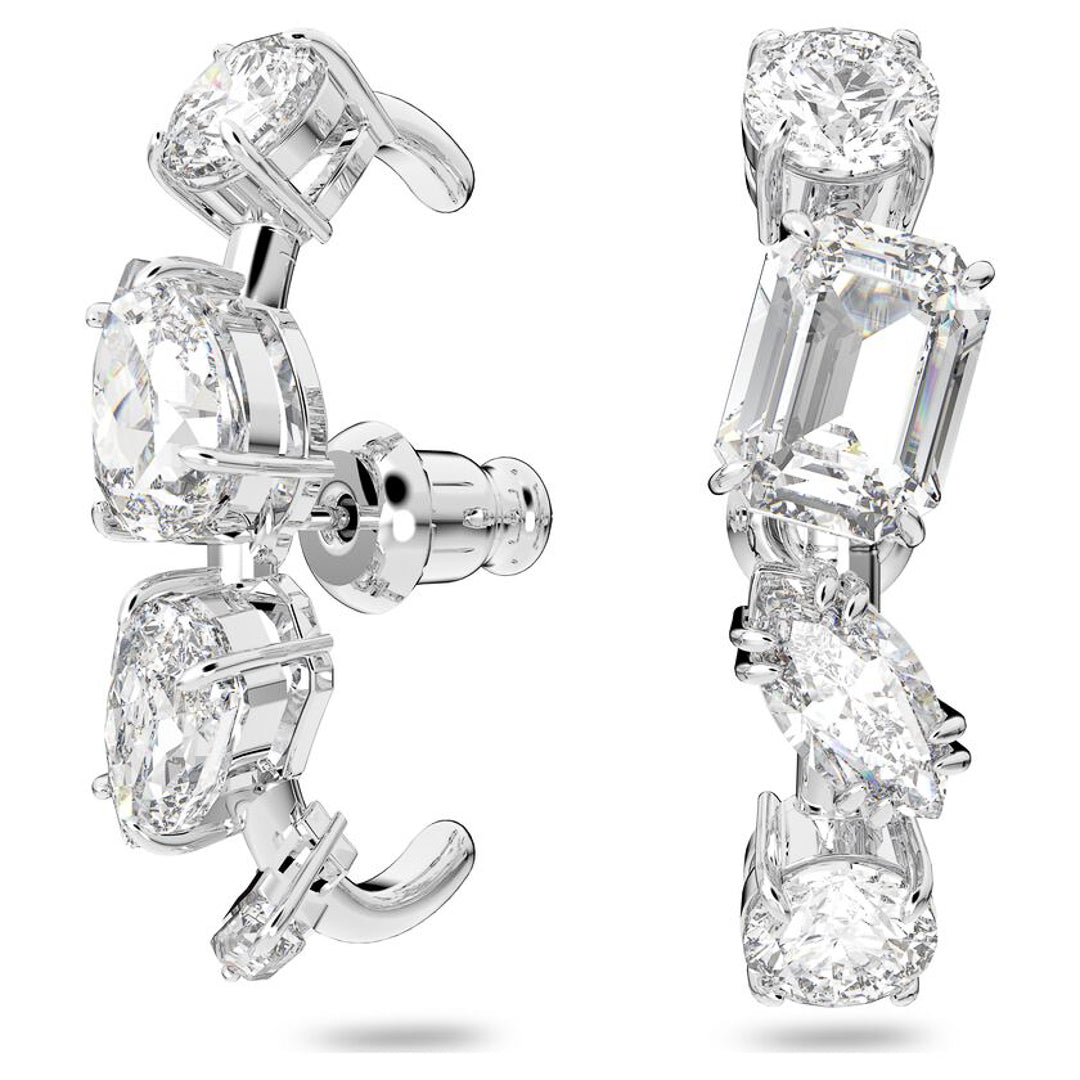 Introducing the Swarovski Gema Ear Cuffs: exquisite silver ear cuffs adorned with dazzling diamonds in a variety of shapes, including round, emerald, and cushion cuts. Enhanced with rhodium plating for extra shine, these gemstones are vertically set to brilliantly reflect light against a white backdrop.