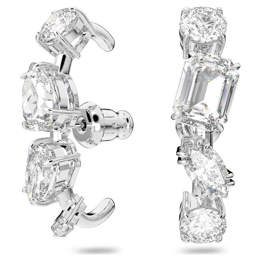 Introducing the Swarovski Gema Ear Cuffs: exquisite silver ear cuffs adorned with dazzling diamonds in a variety of shapes, including round, emerald, and cushion cuts. Enhanced with rhodium plating for extra shine, these gemstones are vertically set to brilliantly reflect light against a white backdrop.