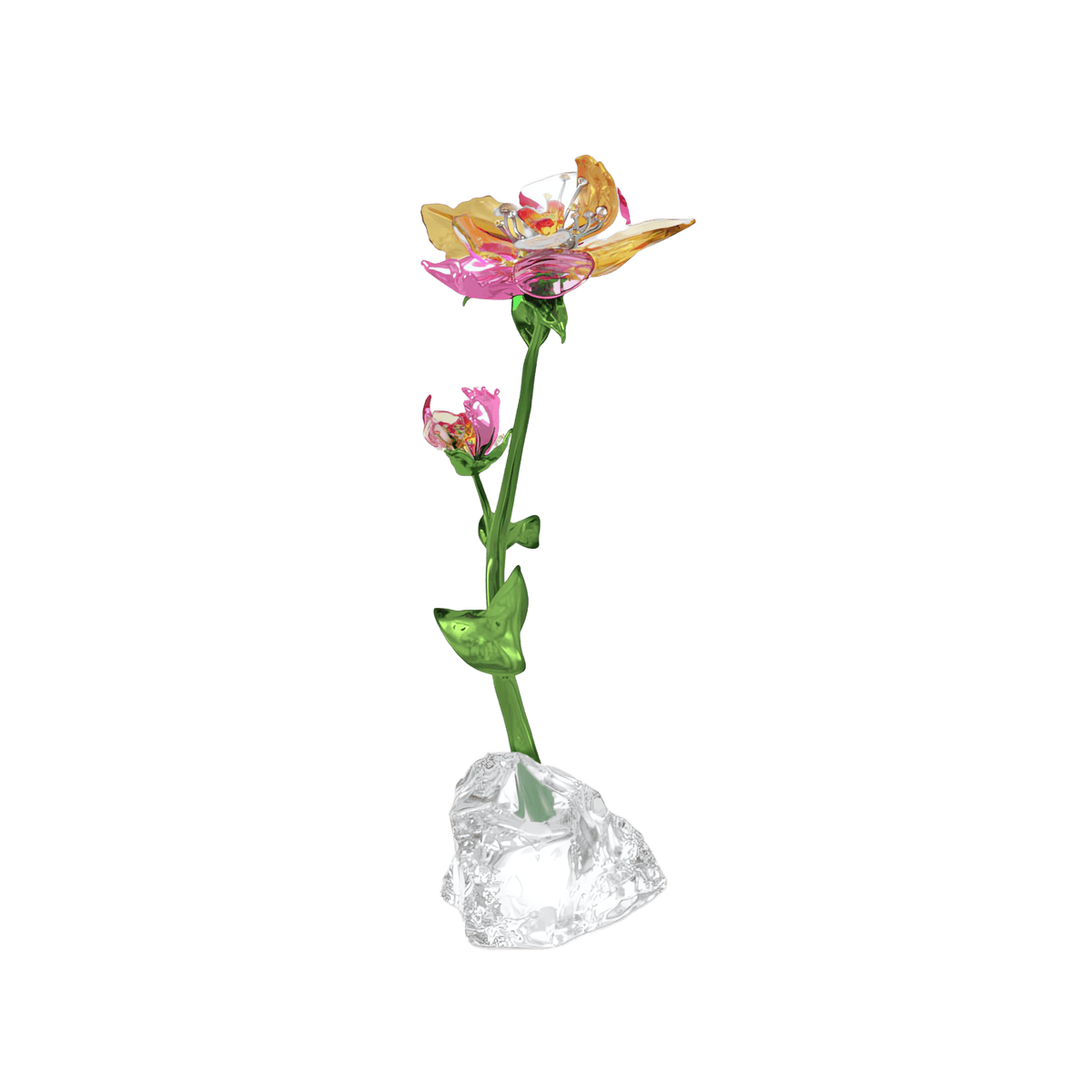 The Swarovski Idyllia Flower Large, available at Raffi Jewellers, is a stunning glass sculpture by Swarovski featuring pink petals, a green stem with leaves, and a clear, textured base displayed against a plain white background.