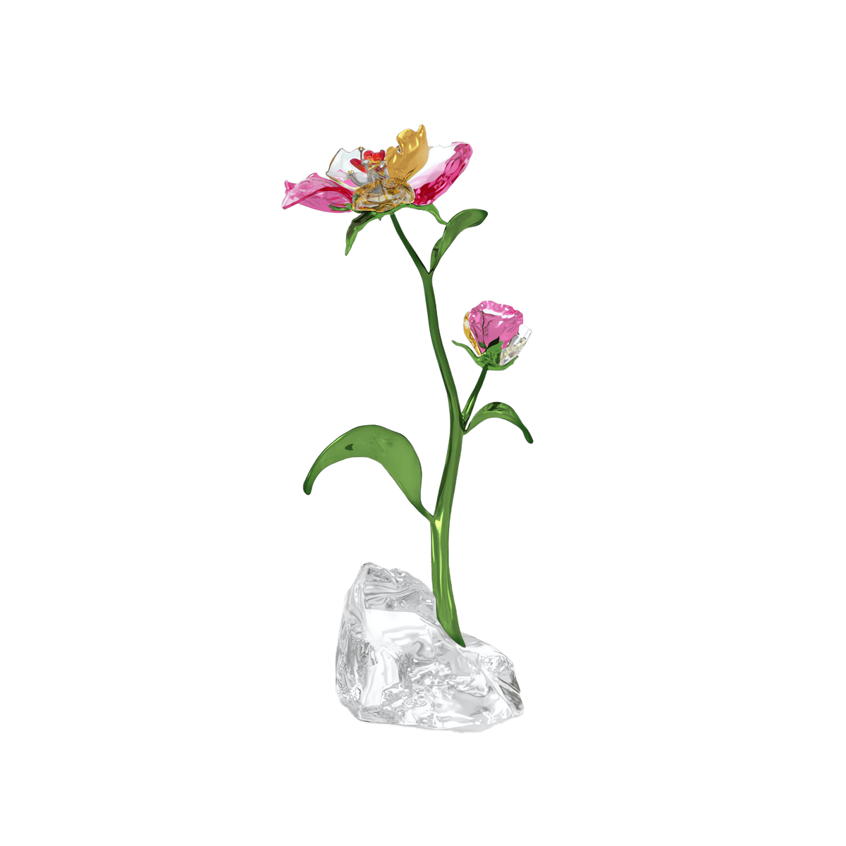 A delicate glass sculpture from the Swarovski Idyllia Flower Large collection features two pink flowers with green stems and leaves, gracefully arranged on a clear, textured glass base against a plain white background. This exquisite creation by Swarovski embodies elegance and is available in Canada at Raffi Jewellers.