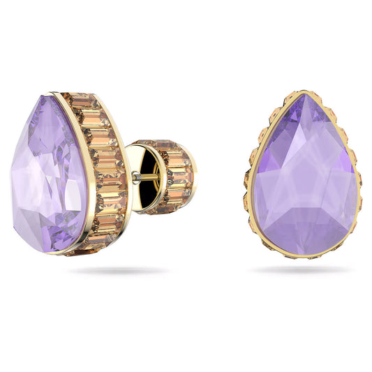 As part of the Swarovski Chroma Stud Earrings collection by Swarovski, these teardrop-shaped earrings feature prominent faceted lavender gemstones set in gold, accented with smaller baguette-cut stones along the edges. The left earring is presented from a side perspective, while the right earring is displayed from a frontal view.