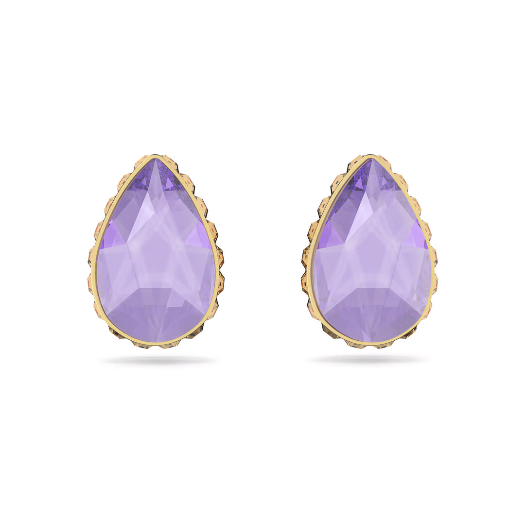 Part of the Swarovski collection, these Chroma stud earrings feature teardrop-shaped purple crystals with a dazzling drop-cut design set in gold. The faceted surface beautifully reflects light, and the gold setting forms a stylish edge against a plain white background.