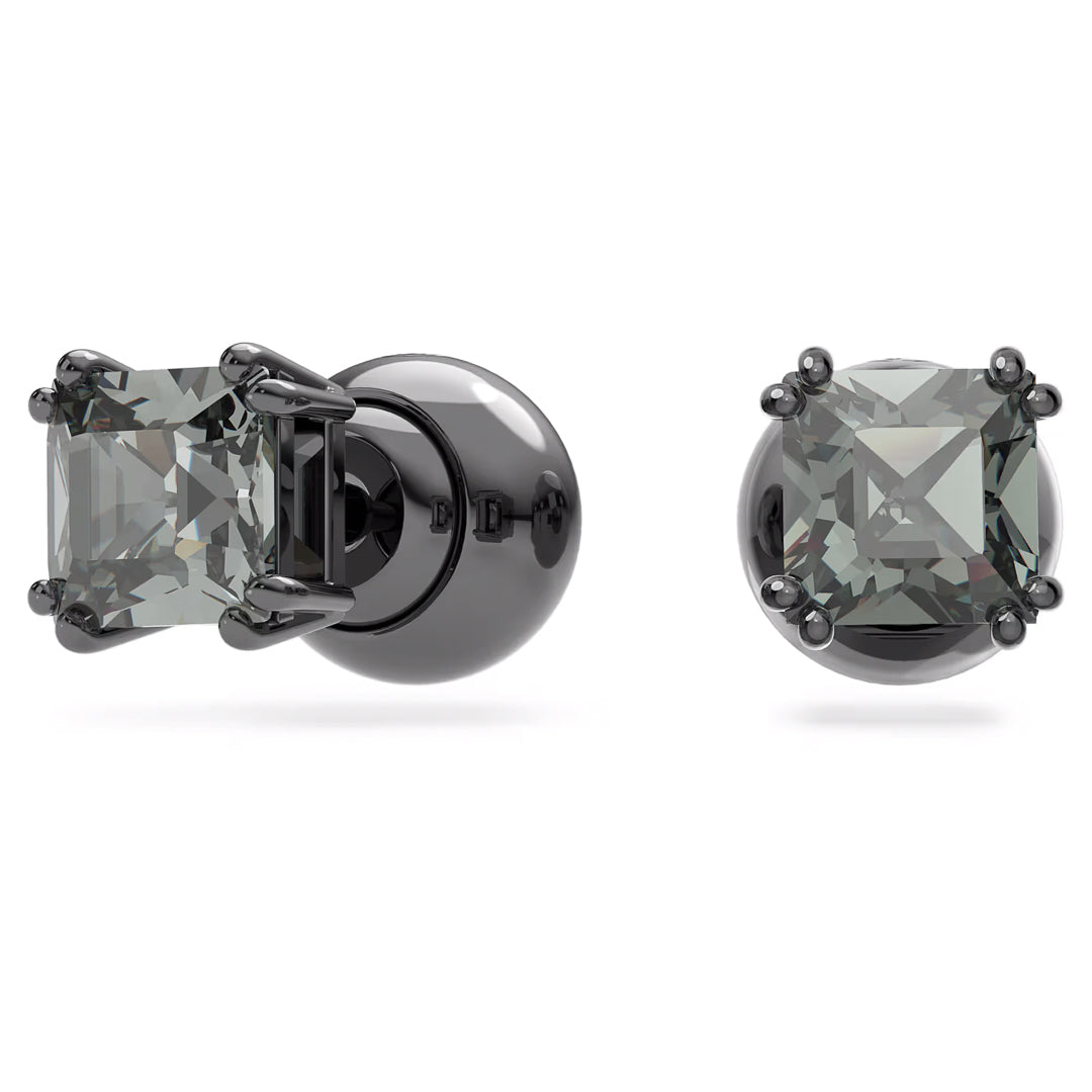 Introducing the Swarovski Millenia Stud Earrings from Swarovski, featuring square-cut crystals set in prongs. The dark gray reflective stones offer a sophisticated and elegant appearance against the shiny black metal with ruthenium plating.