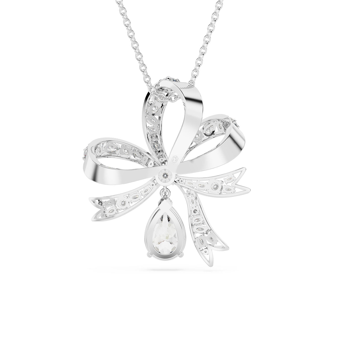 The Swarovski Volta Large Bow Pendant, by Swarovski, is a delicate silver necklace featuring a bow-shaped pendant with rhodium plating for extra shine. It boasts intricate detailing and is adorned with a teardrop-shaped gemstone at its center, all displayed against a plain white background.