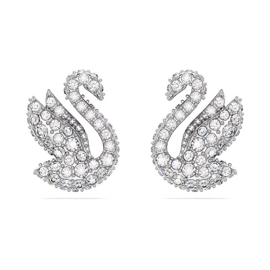 The Swarovski Swan Stud Earrings, featuring an elegant and symmetrical design adorned with pavé crystals, are finished with rhodium plating for a dazzling effect.