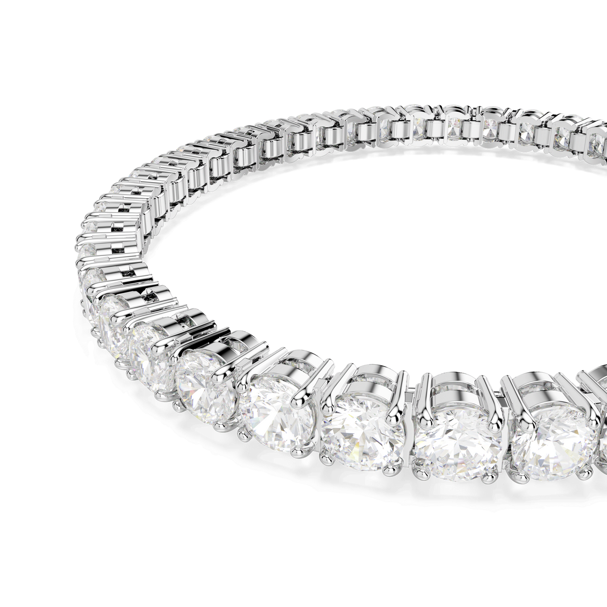 A close-up of the Swarovski Matrix Tennis bracelet, featuring round, brilliant-cut white stones set in a rhodium-plated setting, displayed on a white background.