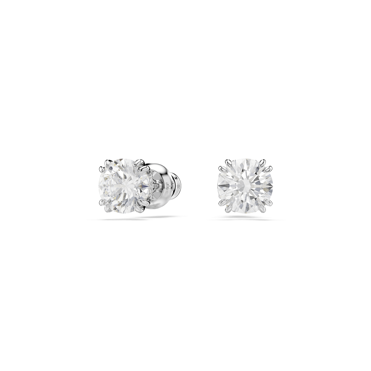 A pair of Swarovski Stilla stud earrings featuring round-cut white stones set in rhodium-plated metal, displayed on a plain white background.