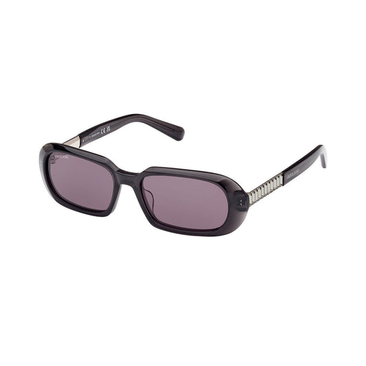 The Swarovski SK0388 Black Sunglasses showcase a striking rectangular design, complete with smoky gray lenses and sleek black acetate frames. The arms are elegantly embellished with a metallic, ribbed pattern.