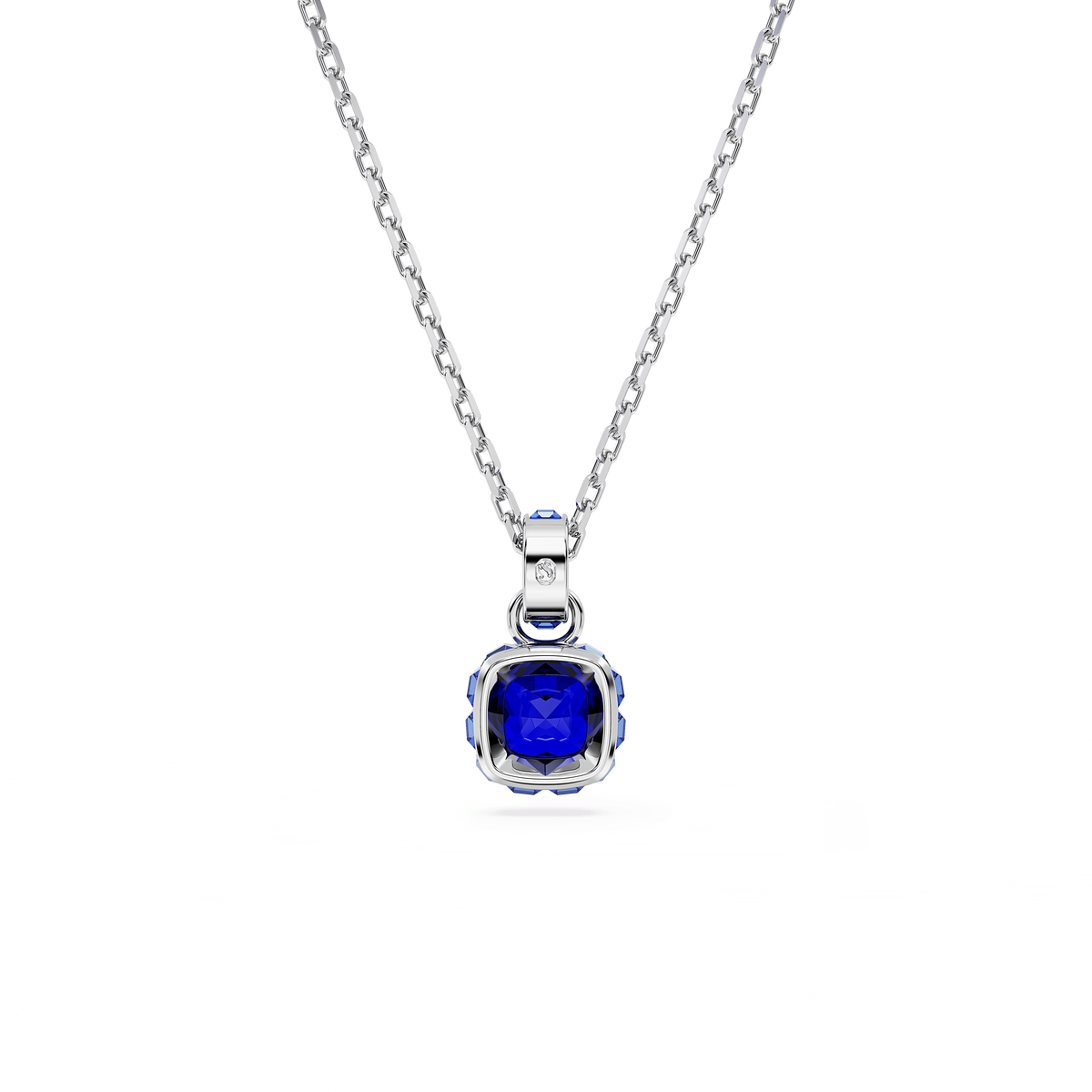 A rhodium plated Swarovski Birthstone pendant for September features a square-cut blue gemstone in a sleek setting, showcased on a delicate chain against a plain white background.
