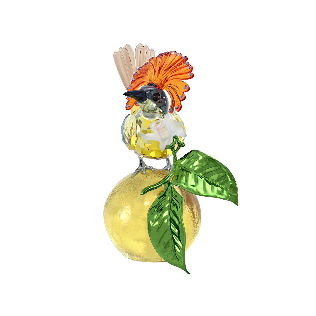 The Swarovski Idyllia Royal Flycatcher by Swarovski features a vibrant glass bird with an orange crest and yellow body, elegantly perched atop a yellow crystal sphere embellished with two green leaves, all set against a white background.