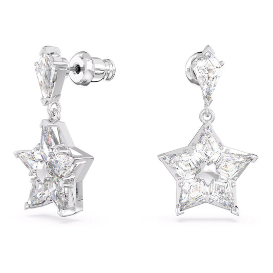 The Swarovski Stella Drop Earrings by Swarovski are elegant silver star-shaped earrings with rhodium plating, featuring sparkling diamond-like stones. Each enchanting earring has a small geometric stone on top that connects to a larger star motif below.