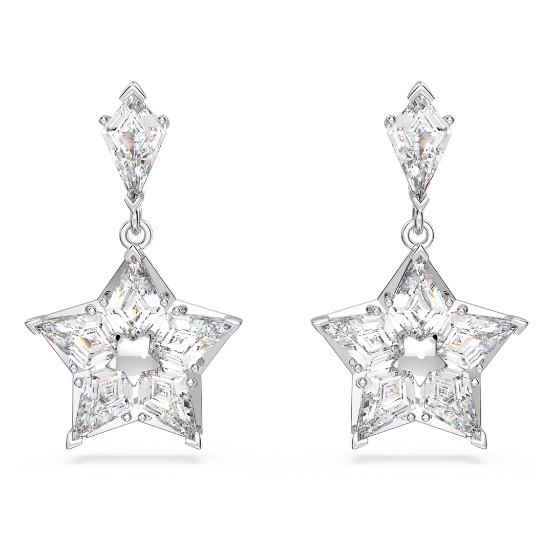 Introducing the Swarovski Stella Drop Earrings by Swarovski, a pair of dangling earrings showcasing a captivating star motif adorned with clear gemstones. The design is accented with smaller geometric stones positioned above the stars, all set in brilliant rhodium plating. These earrings exude an elegantly sparkling charm, adding an enchanting touch to any ensemble.