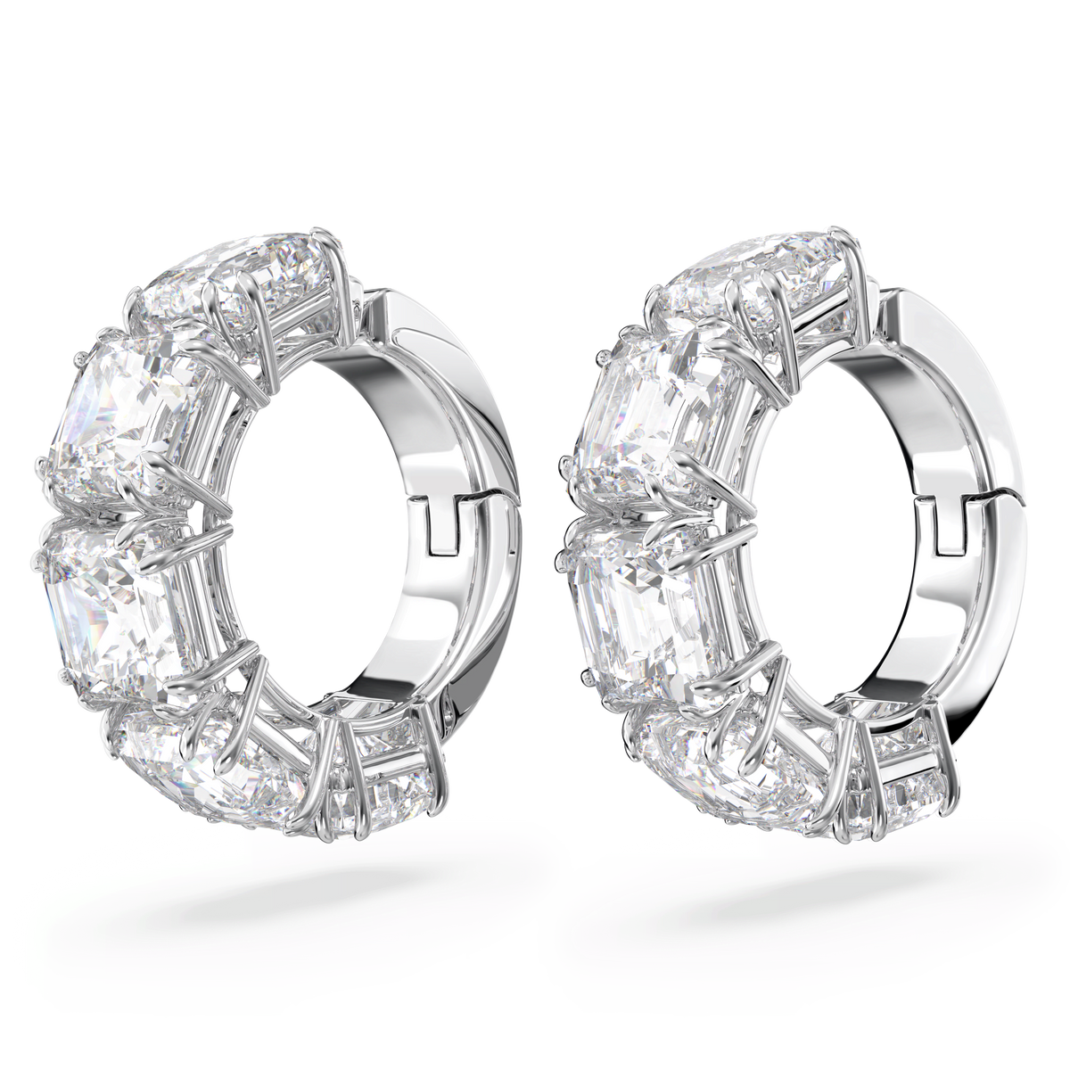 A pair of Swarovski Matrix clip earrings, featuring square-cut white gemstones set along the front and finished in rhodium plating, are displayed on a plain white background.