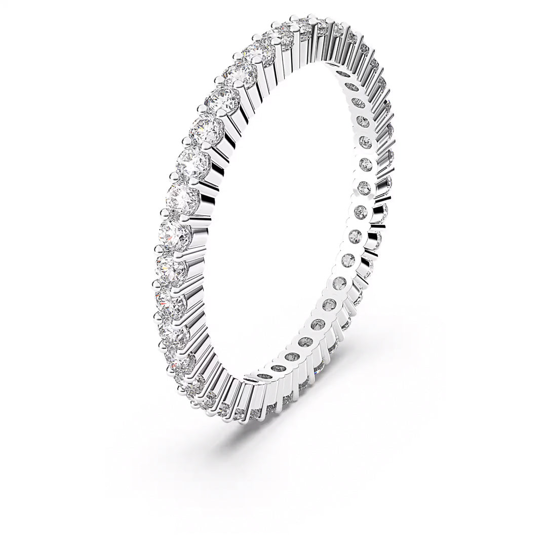 The Swarovski Vittore Ring is a beautifully crafted piece featuring a silver-tone finish and a continuous line of zirconia, creating an elegant circular design set against a plain white background.