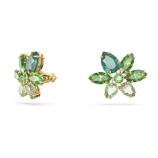 The Swarovski Gema Stud Earrings from Swarovski boast gold-tone plating, adorned with green and blue gemstones meticulously arranged in a floral pattern. This exquisite design features marquise, pear, and round cuts that harmonize light and dark green stones with a touch of blue, all enhanced by sparkling green crystals.