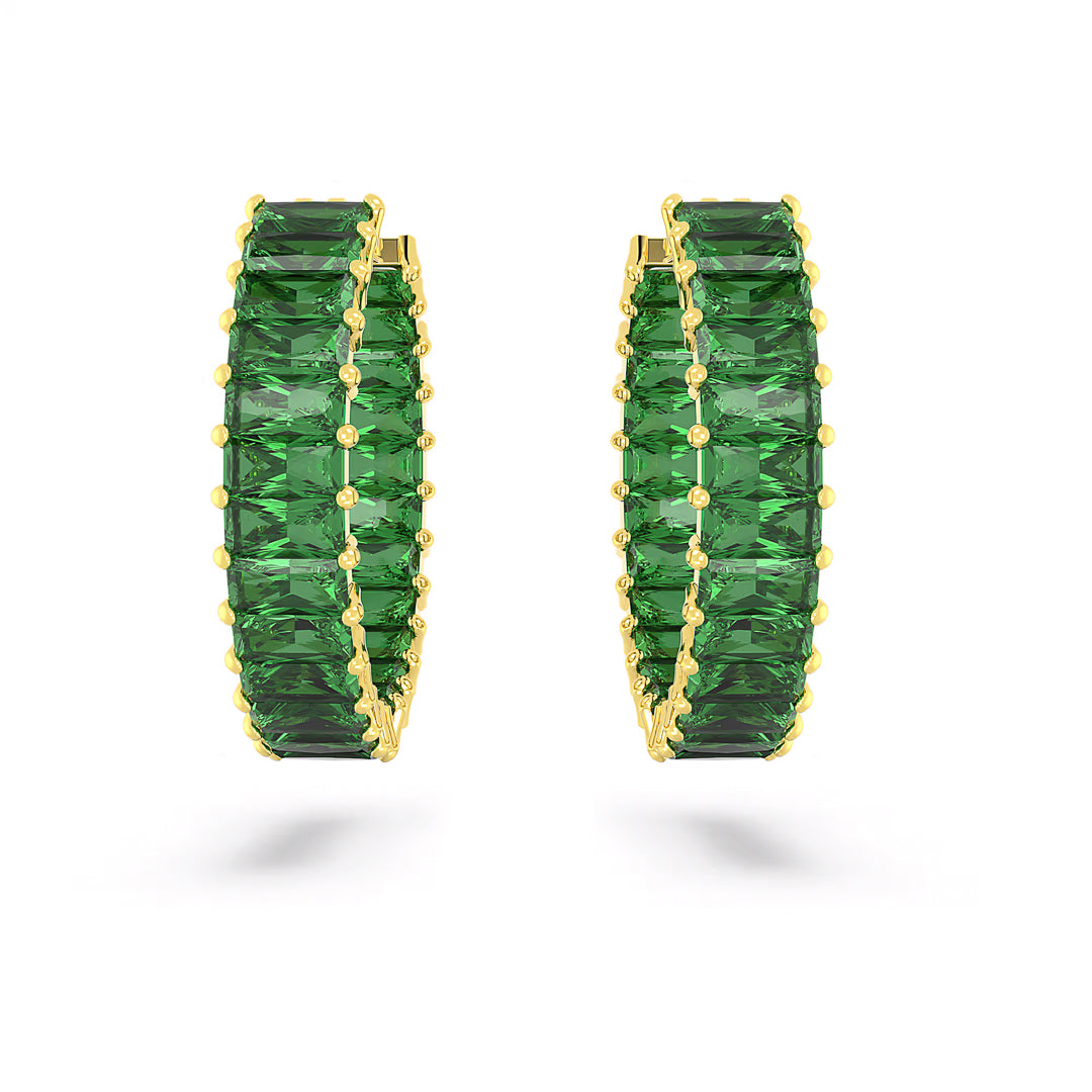 Swarovski Matrix Hoop Earrings adorned with deep green stones encircling the entire gold-tone plated hoop.