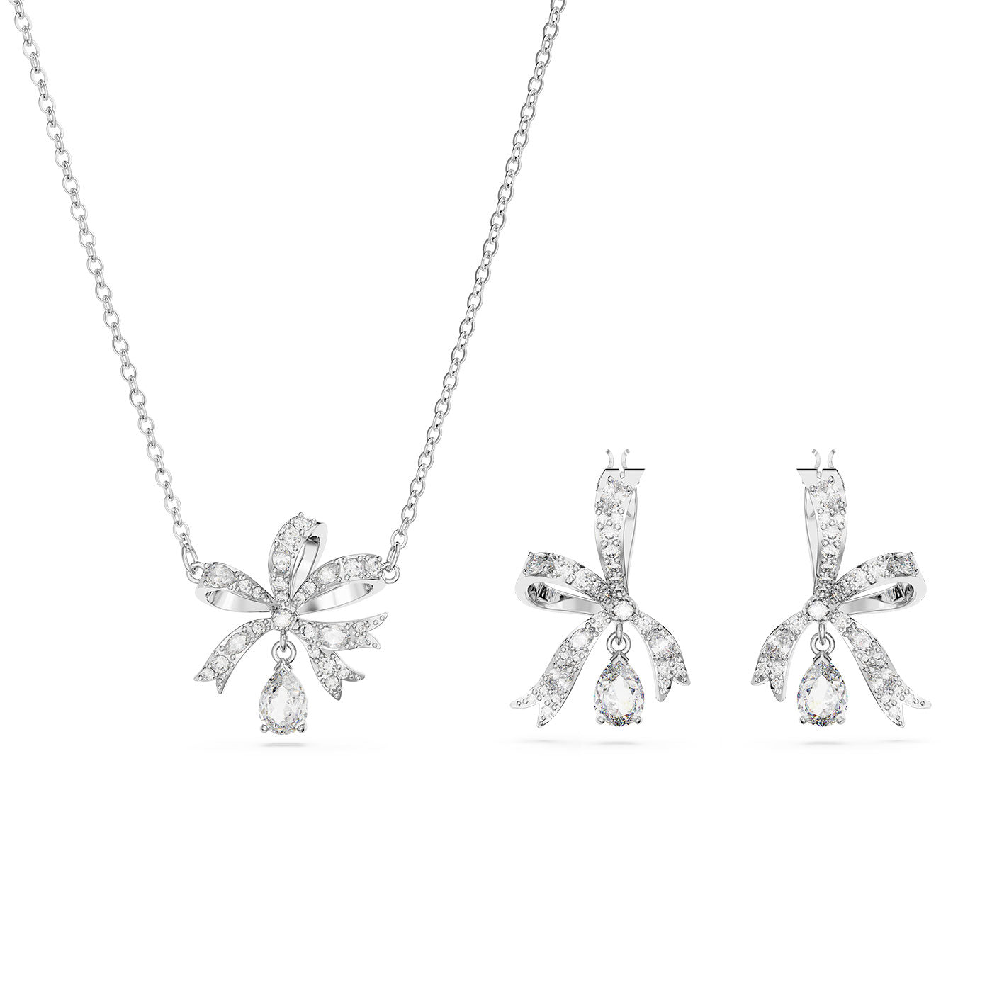 Explore the Swarovski Bow Volta Necklace and Earrings Set by Swarovski, which includes a rhodium-plated necklace and coordinating earrings. Each piece features sophisticated bow-shaped designs embellished with clear crystals, complemented by a teardrop-shaped stone that elegantly hangs from the center of each bow.