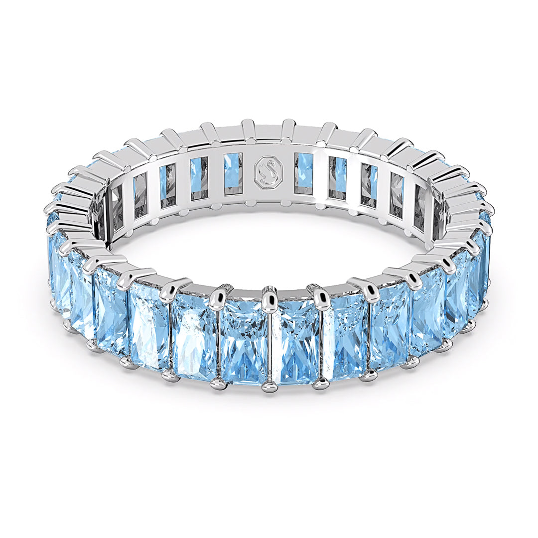 This Swarovski Matrix Ring showcases a stunning series of large, rectangular aquamarine gemstones that encircle the entire band. Each gemstone is set in a prong setting, creating an elegant design that captures the timeless appeal of princess baguette-cut stones.