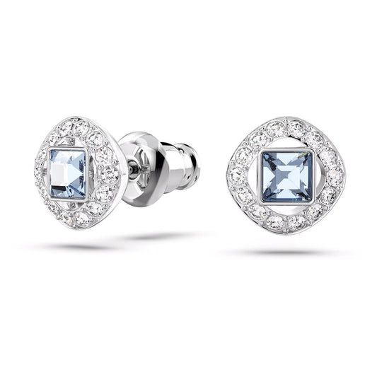 The Swarovski Angelic Stud Earrings by Swarovski feature rhodium-plated silver with a square blue center stone, surrounded by small clear crystals in a rhombus-shaped design. They come with push-back closures.