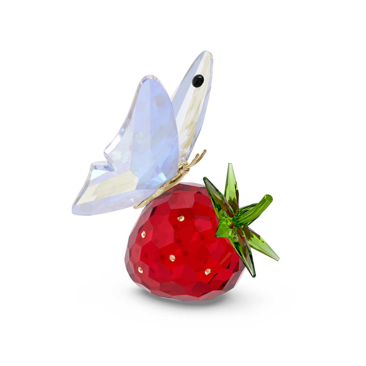 The Swarovski Idyllia Butterfly and Strawberry figurine by Swarovski features a light purple butterfly delicately perched on a faceted red strawberry with green leaves. Accented with lacquered metal and sparkling crystal facets, this enchanting piece is set against a plain white background—an exquisite addition to any butterfly-themed home décor.