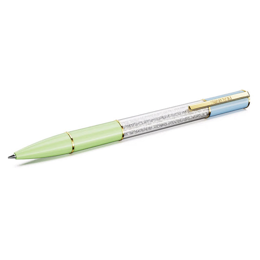 The Swarovski Crystalline Lustre Ballpoint Pen is a sophisticated writing instrument featuring a green barrel, gold accents, and a transparent section adorned with dazzling crystals. The pen's clip is blue and elegantly inscribed with "NOBEL." Displayed against a white background, this pen exemplifies elegance and sparkle in its every detail.