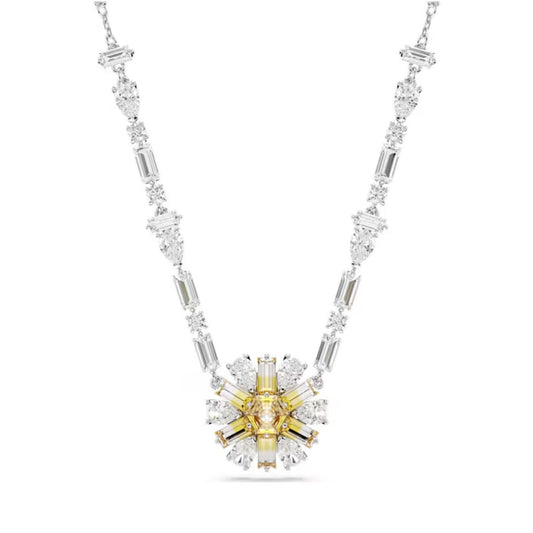 Introducing the Swarovski Yellow Idyilla Flower Necklace Pendant, which highlights a captivating two-tone pendant with a radiant starburst design. This piece is expertly crafted from yellow and rhodium-plated metals and embellished with dazzling Swarovski Zirconia. The necklace chain is elegantly designed with an intricate mix of diamond-shaped links.