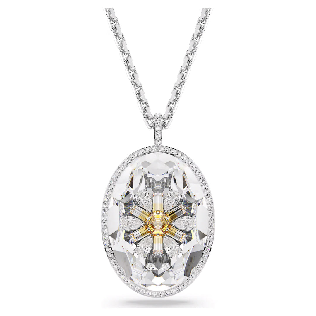 The Swarovski Idyllia Necklace Pendant, featuring an oval-shaped diamond-like gemstone with intricate facets and a star-inspired design at its center, is set in a rhodium-plated frame that captures the elegance synonymous with Swarovski. Suspended from a delicate silver chain, its floral-inspired design both captivates and enchants.