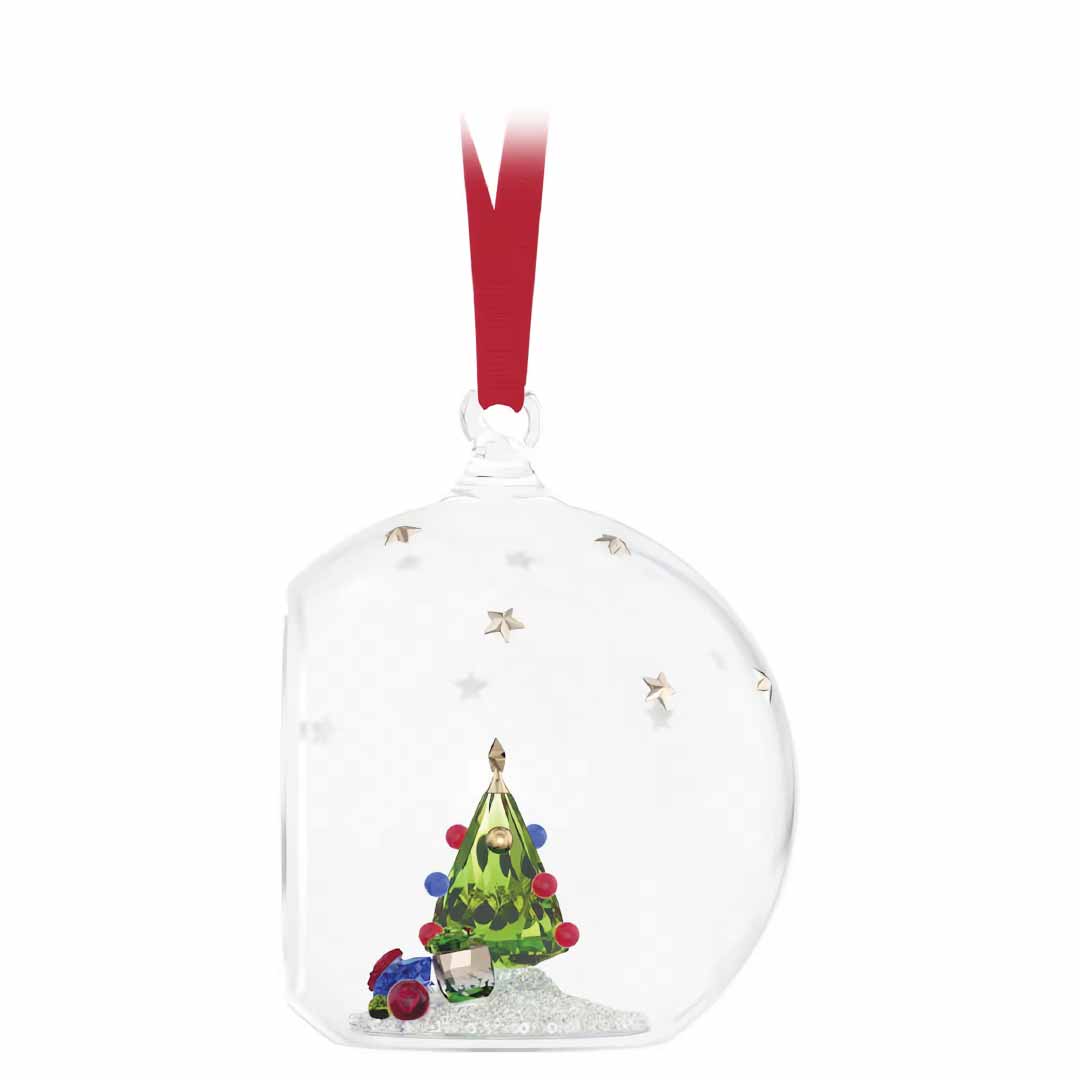 The Swarovski Holiday Cheers Tree and Gifts Ball Ornament by Swarovski is a spherical clear decoration featuring a red ribbon. Inside, it displays a miniature green Christmas tree adorned with vibrant baubles, surrounded by shimmering stars and white snow at the base, making it an ideal addition for adding charm to any holiday setting.