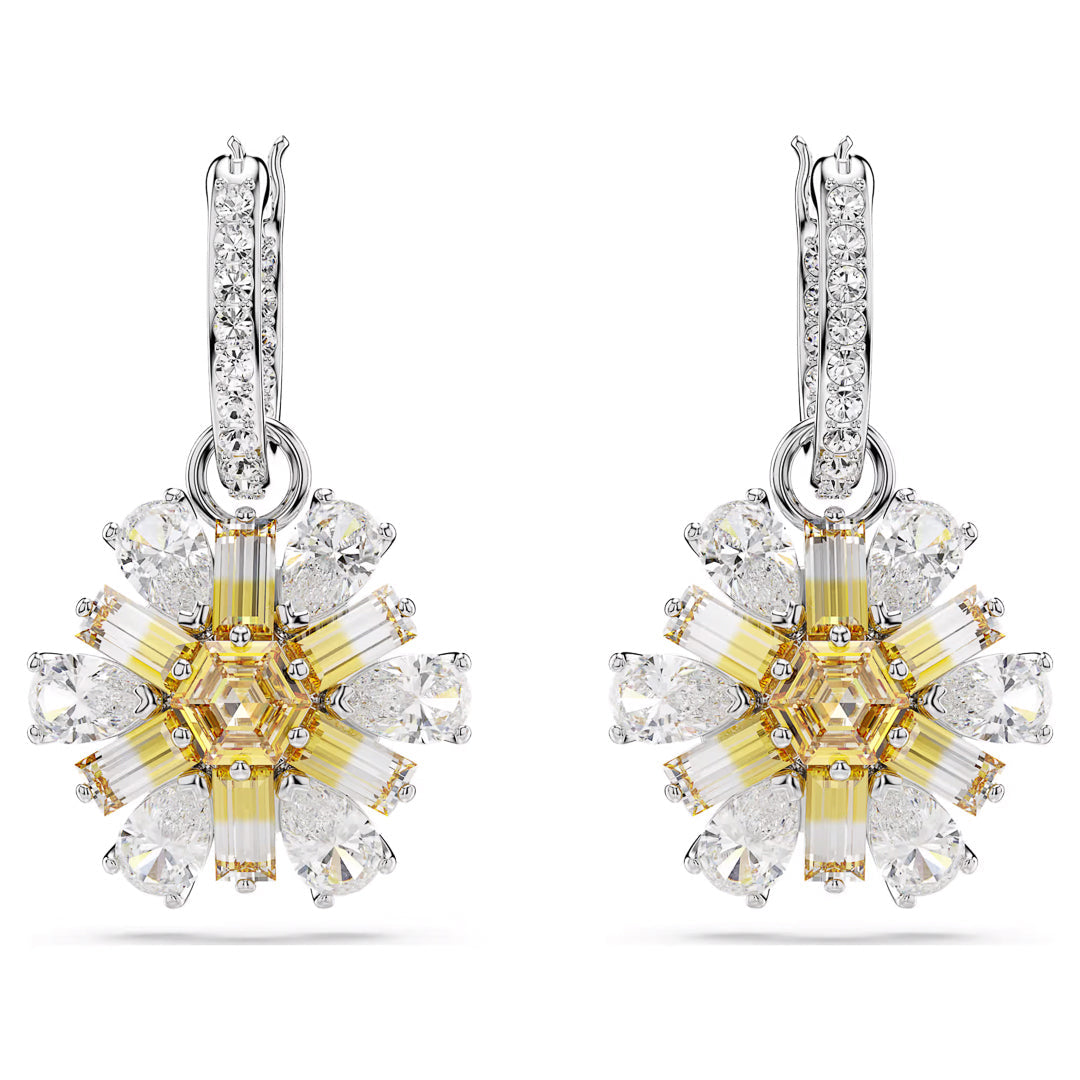 Introducing the Swarovski Idyllia Drop Earrings by Swarovski, these elegant rhodium-plated earrings showcase a stunning star-shaped design adorned with clear and yellow gemstones. Each earring is designed with a metallic loop encrusted with Swarovski Zirconia, featuring a central yellow stone elegantly encircled by a pattern of clear stones.