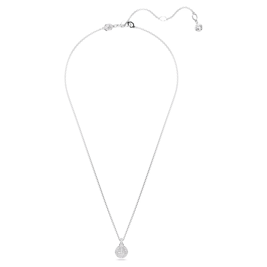 The Swarovski Sublima Necklace Pendant by Swarovski is a delicate silver piece featuring a galaxy-inspired pendant adorned with clear round crystals. Its rhodium-plated design includes an adjustable clasp finished with a small charm at the end, all beautifully displayed against a white background.