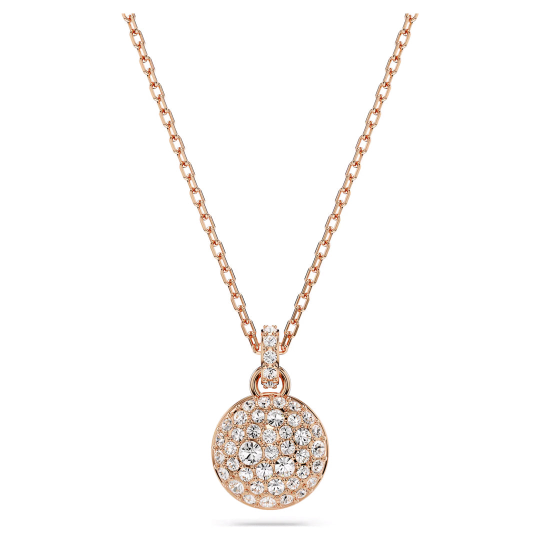 The Swarovski Sublima Necklace Pendant by Swarovski is a rose gold-tone piece featuring a galaxy-inspired round pendant adorned with closely set clear crystals that create a shimmering effect. Its chain showcases interlocking links, adding elegance to its design.