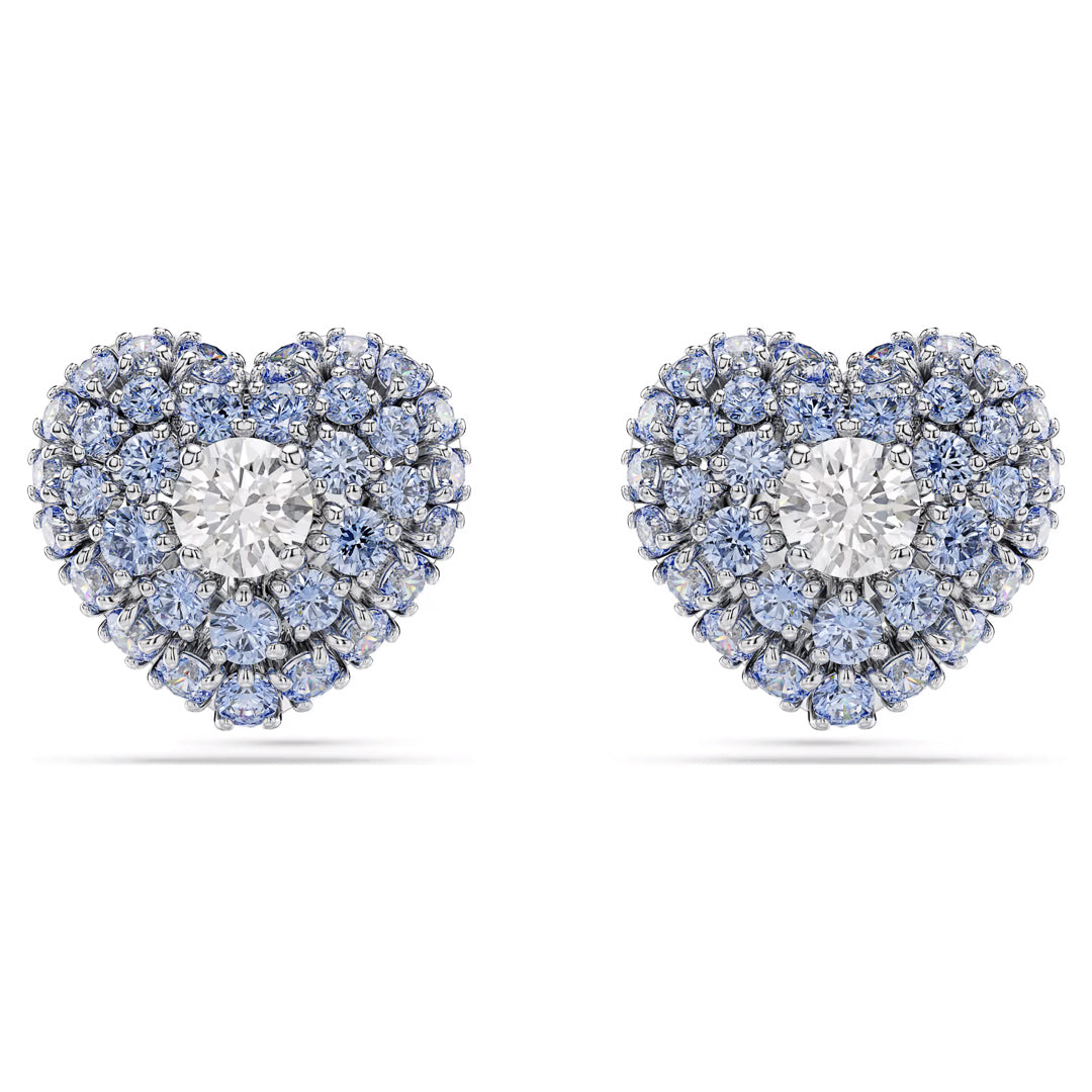 Swarovski Idyllia Stud Earrings, rhodium-plated studs designed with small blue gemstones and a central larger Swarovski Zirconia, featuring an intricate and symmetrical heart-shaped design by Swarovski.