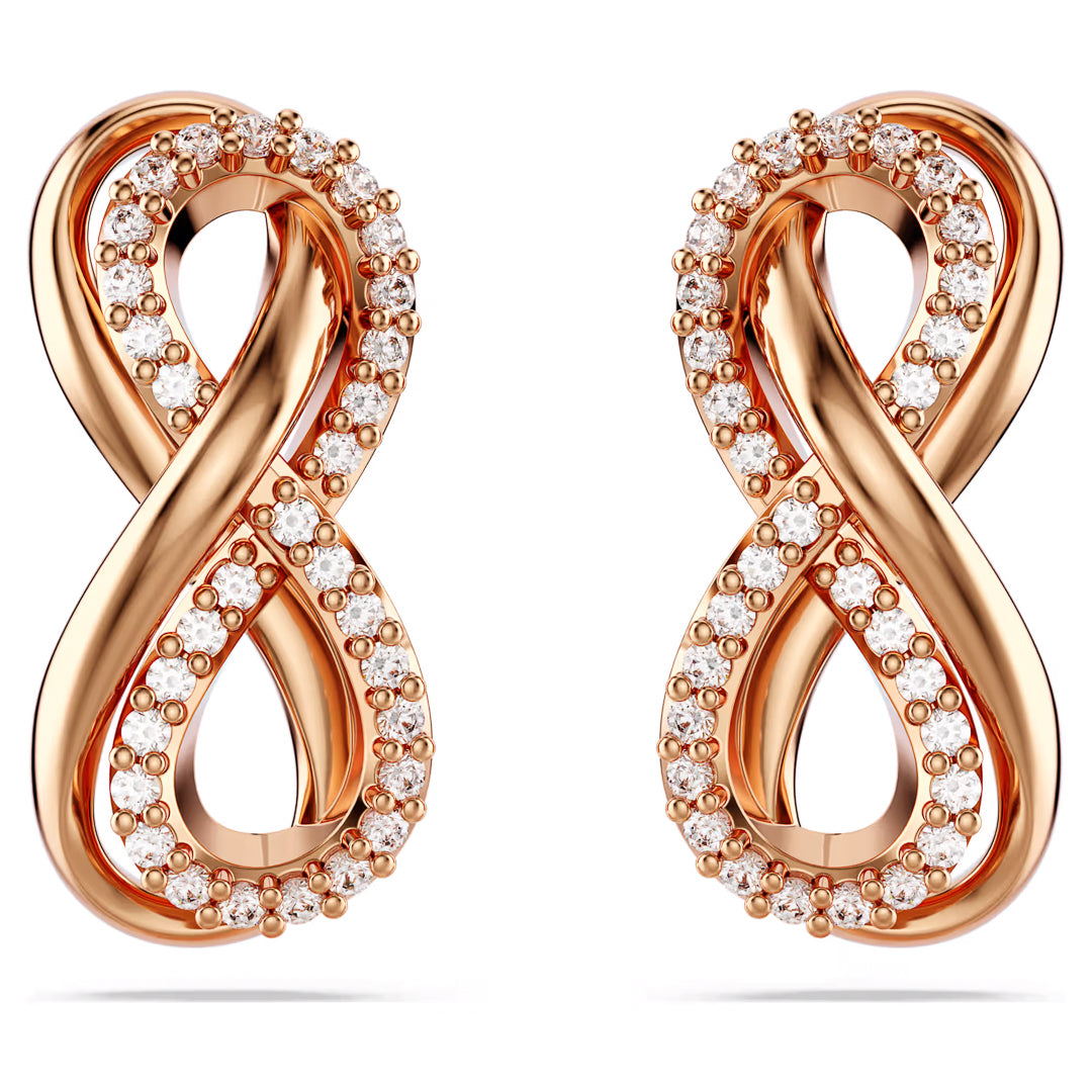 Introducing the Swarovski Hyperbola Stud Earrings from Swarovski, featuring an elegant infinity symbol design. These earrings are crafted from rose gold-tone plated metal and adorned with sparkling Swarovski Zirconia, showcasing a symmetrical and polished style with exquisite attention to detail and luxurious craftsmanship.