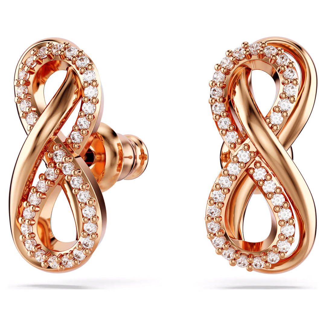 Swarovski Hyperbola Stud Earrings, crafted with rose gold-tone plating and a symmetrical infinity shape, are adorned with small diamonds and sparkling Swarovski Zirconia details. With their polished finish, these elegant earrings from Swarovski add a touch of brilliance to any outfit.