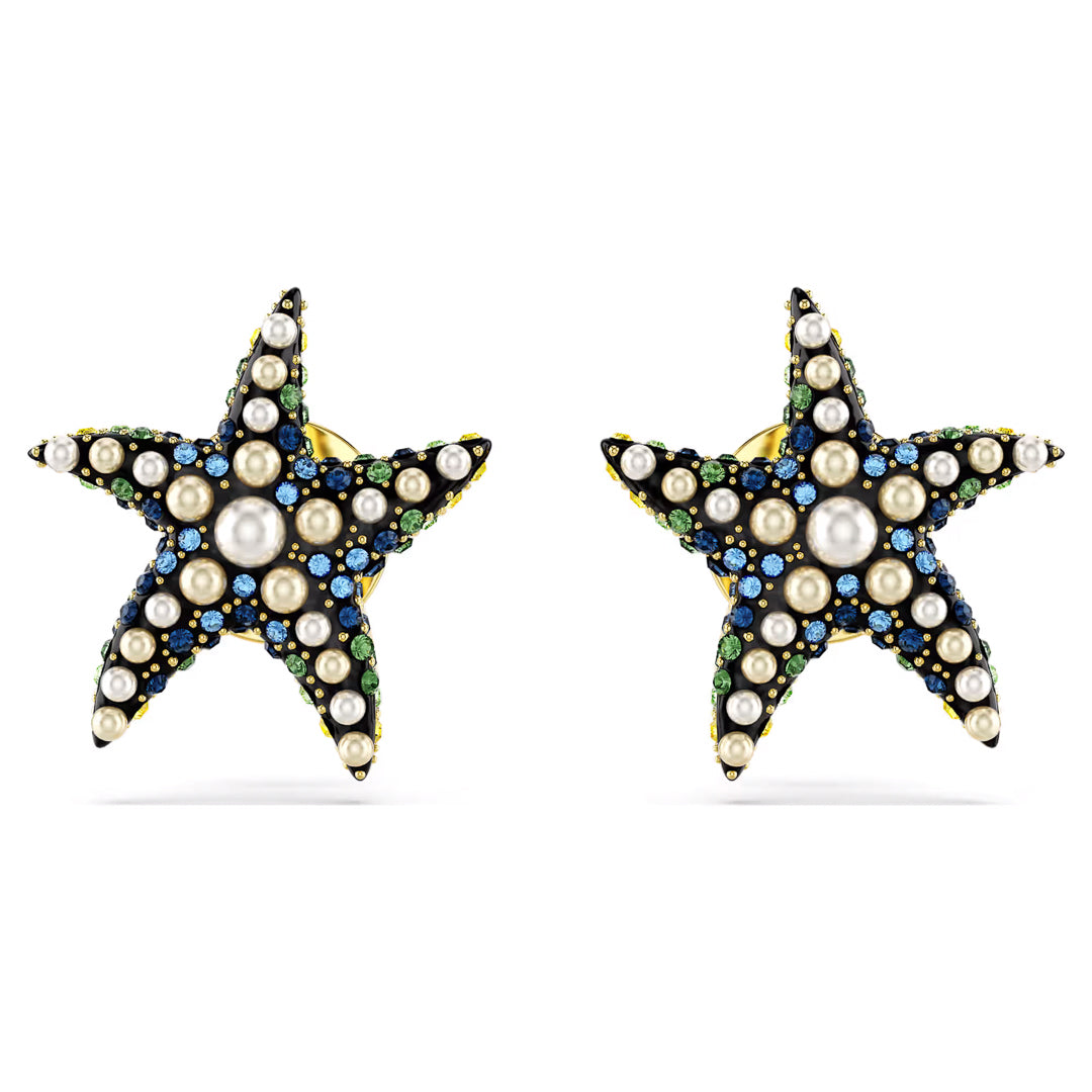 The Swarovski Idyllia Stud Earrings by Swarovski are adorned with ocean-inspired small pearls and gemstones in blue, green, and black. Their intricate design resembles a starfish with a symmetrical arrangement of stones and pearls, creating a vibrant and luxurious appearance.