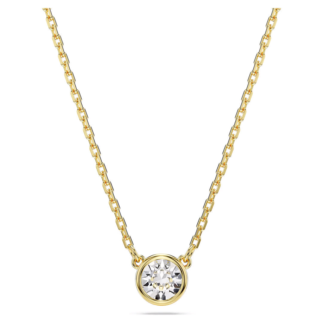 Introducing the Swarovski Imber Necklace Pendant by Swarovski, a sophisticated and minimalistic piece featuring a gold-tone plated chain adorned with an elegant Imber pendant. This stunning pendant showcases a single Swarovski Zirconia set in a sleek gold bezel.