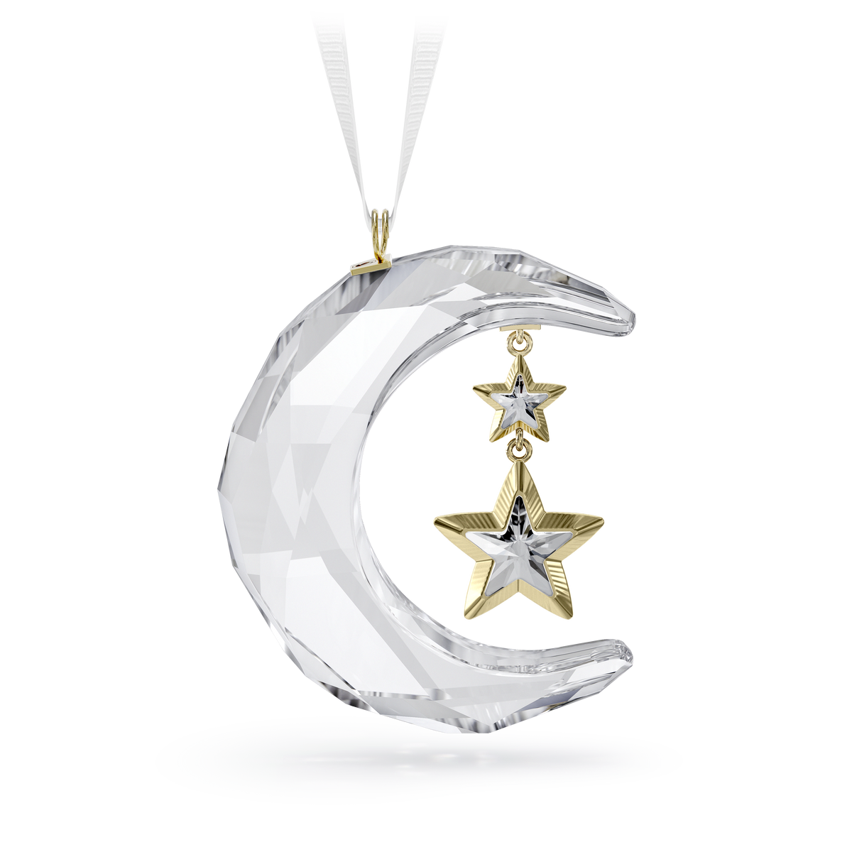 The Swarovski Holiday Magic Moon Ornament by Swarovski features a faceted crystal crescent moon with two gold and silver stars suspended inside, all attached to a white ribbon. Displayed on a white background, this celestial ornament makes a stunning addition to your holiday décor.